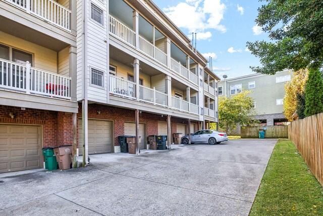 3200 Long Blvd Unit 4, Nashville, TN 37203 - view of apartment building / complex featuring driveway and a garage