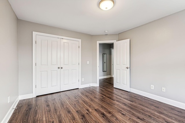 3200 Long Blvd Unit 4, Nashville, TN 37203 - unfurnished bedroom featuring dark wood-style floors and a closet