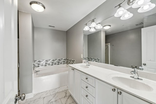 3200 Long Blvd Unit 4, Nashville, TN 37203 - full bathroom with a bath, double vanity, and marble look tiles