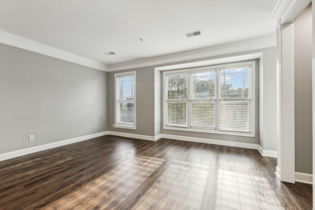 3200 Long Blvd Unit 4, Nashville, TN 37203 - empty room featuring ornamental molding, plenty of natural light, and dark wood finished floors