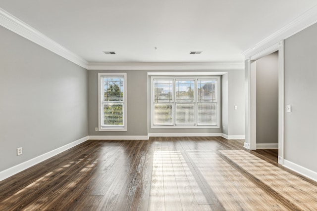 unfurnished room featuring hardwood / wood-style flooring and ornamental molding