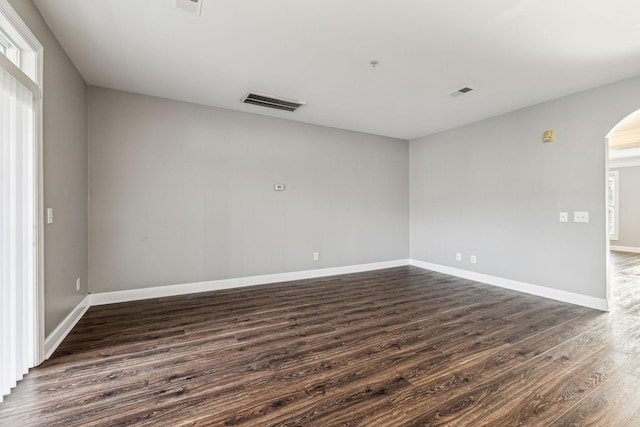 3200 Long Blvd Unit 4, Nashville, TN 37203 - unfurnished room with dark wood-style floors and arched walkways