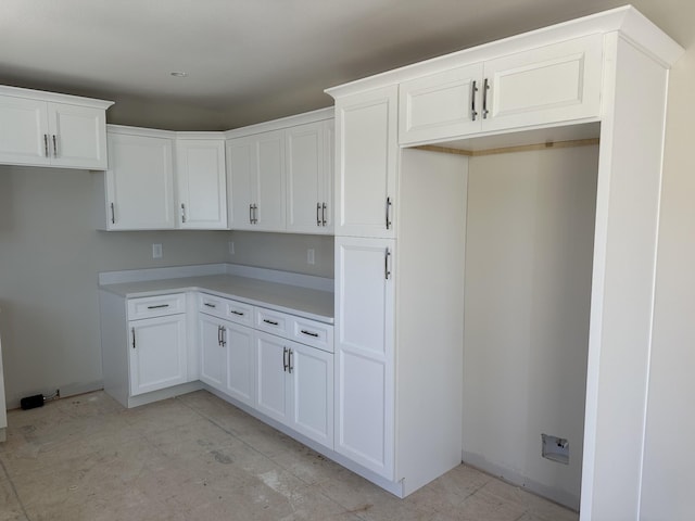 kitchen with white cabinets