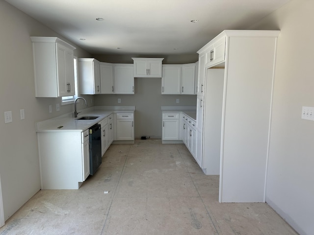 kitchen with white cabinetry, sink, and dishwasher