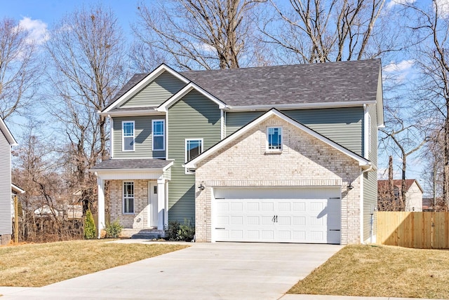 view of front of home featuring a front yard, roof with shingles, fence, and driveway