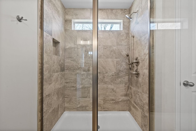 bathroom featuring a stall shower