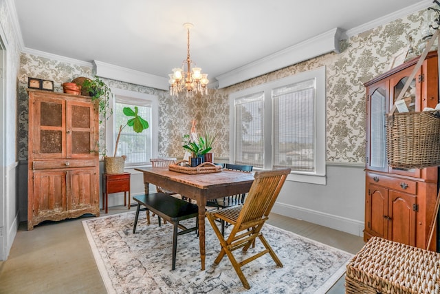 dining room with an inviting chandelier and crown molding