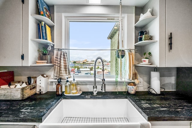 kitchen with tasteful backsplash and sink