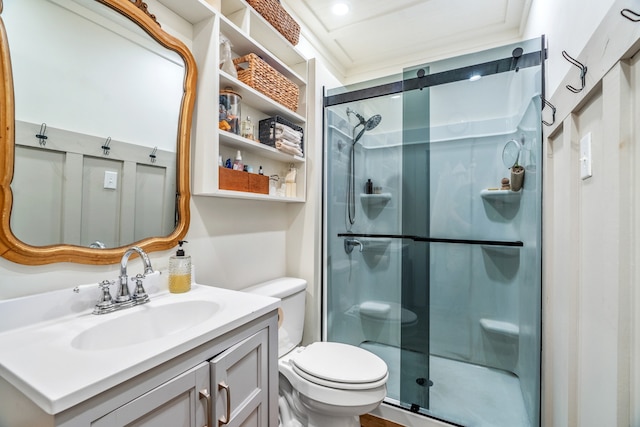 bathroom with vanity, toilet, and walk in shower