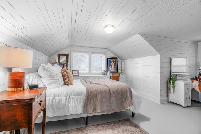 bedroom with wooden walls, wood ceiling, and vaulted ceiling