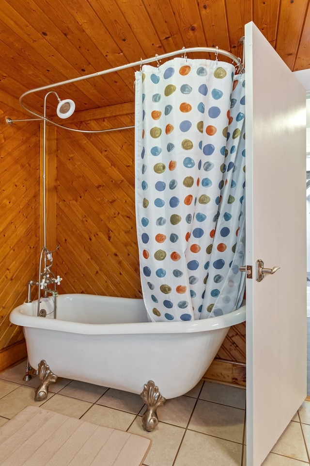 bathroom with wood walls, tile patterned flooring, and wooden ceiling