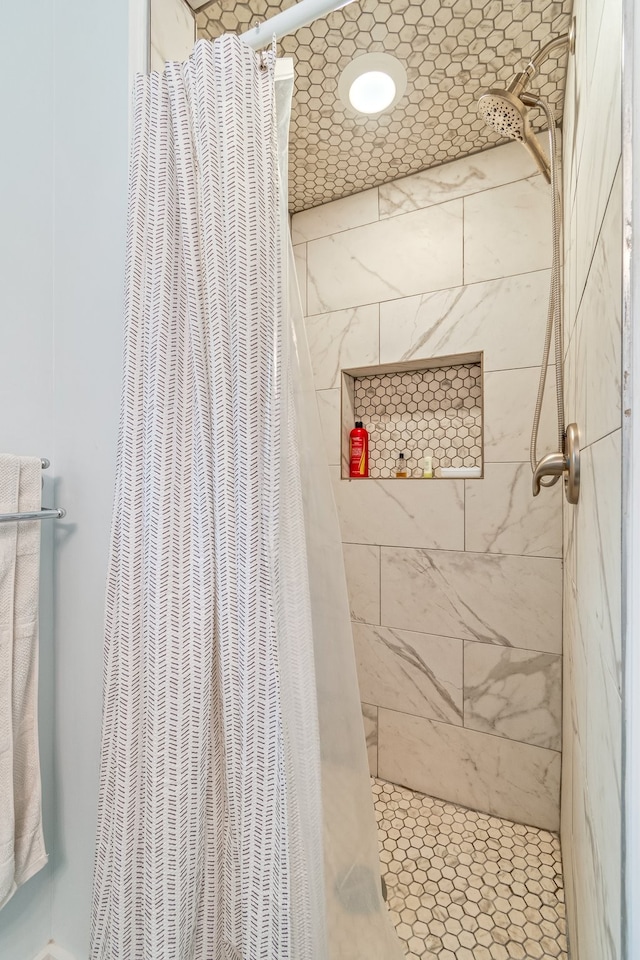 bathroom with curtained shower