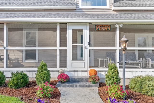 property entrance featuring covered porch