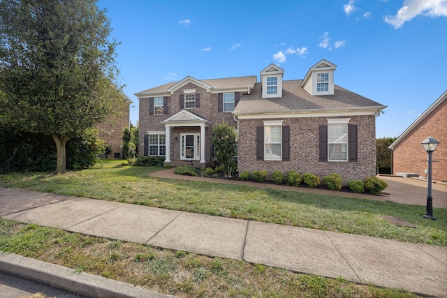 view of front of property with a front yard