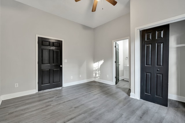 interior space with light wood-type flooring and ceiling fan