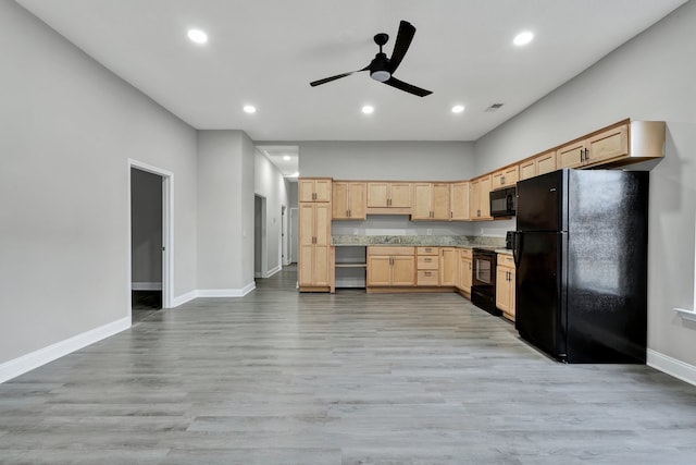 kitchen featuring ceiling fan, sink, light hardwood / wood-style flooring, light brown cabinetry, and black appliances