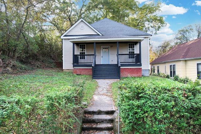 bungalow-style home with a porch