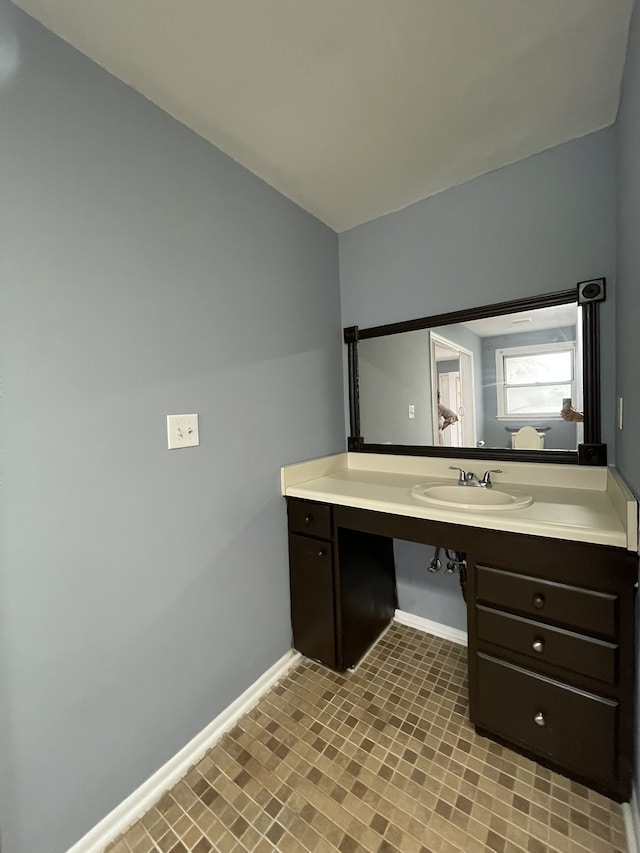 bathroom with vanity and tile patterned floors