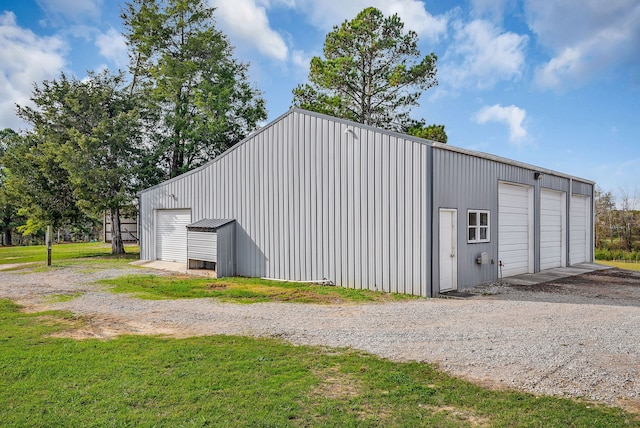 view of outbuilding featuring a garage