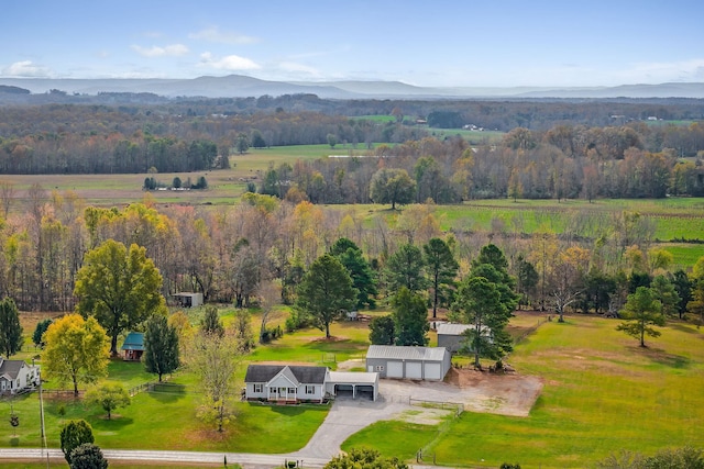 birds eye view of property featuring a mountain view and a rural view