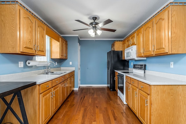 kitchen featuring ceiling fan, sink, dark hardwood / wood-style floors, white appliances, and ornamental molding