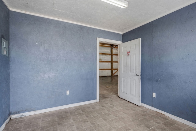 spare room with ornamental molding