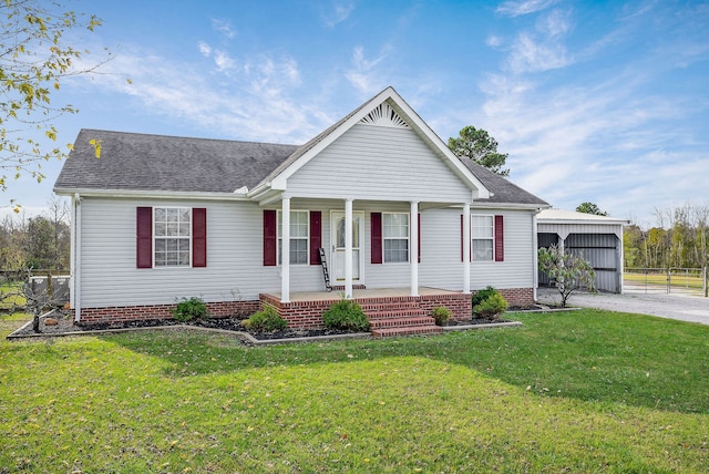 view of front of home featuring covered porch and a front yard