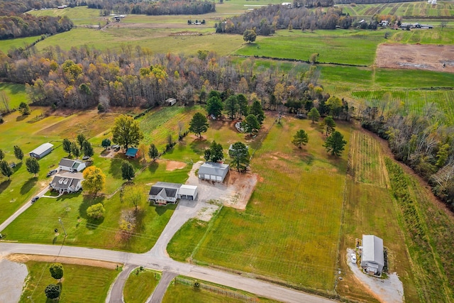 birds eye view of property featuring a rural view