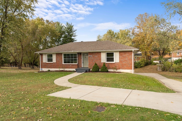 single story home with a front yard