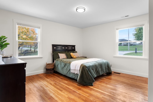 bedroom featuring light hardwood / wood-style floors