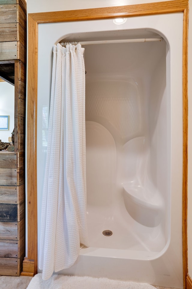 bathroom featuring curtained shower