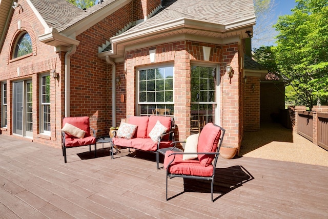 deck with an outdoor hangout area