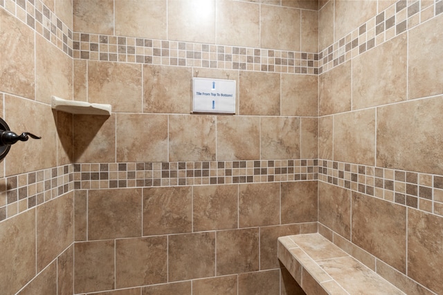 details with a tile shower