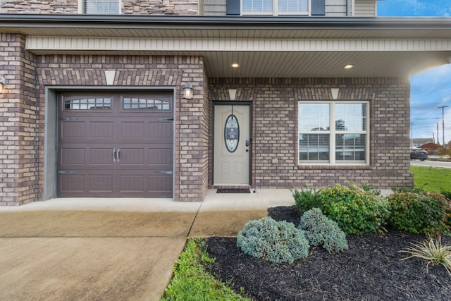 view of exterior entry featuring a porch