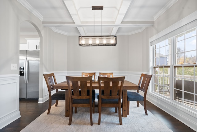 dining room featuring beam ceiling, ornamental molding, dark wood-type flooring, and coffered ceiling