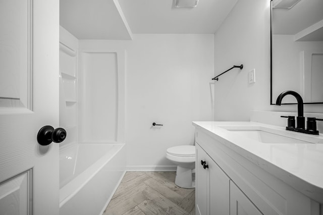 full bathroom featuring vanity, bathtub / shower combination, and toilet