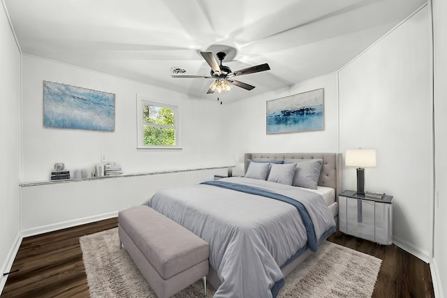 bedroom featuring ceiling fan and dark hardwood / wood-style flooring