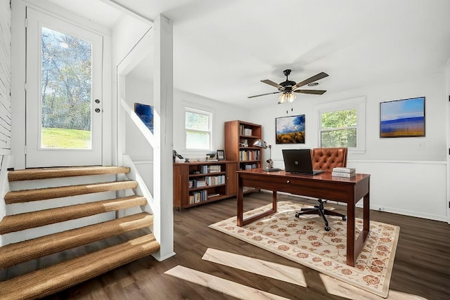 office space featuring ceiling fan, dark hardwood / wood-style flooring, and a wealth of natural light