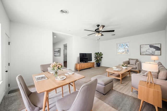 living room with ceiling fan