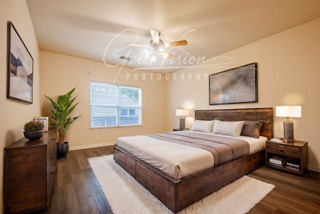 bedroom featuring dark hardwood / wood-style floors and ceiling fan