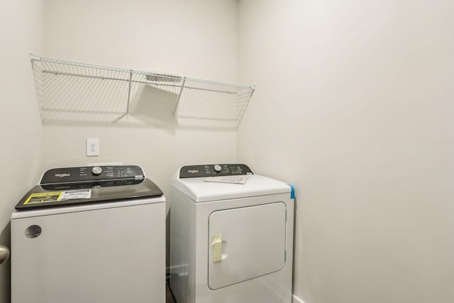 laundry area featuring washing machine and dryer