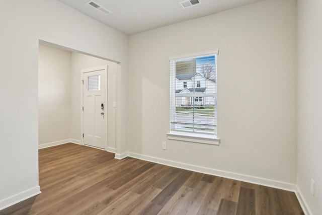 entrance foyer with dark hardwood / wood-style flooring