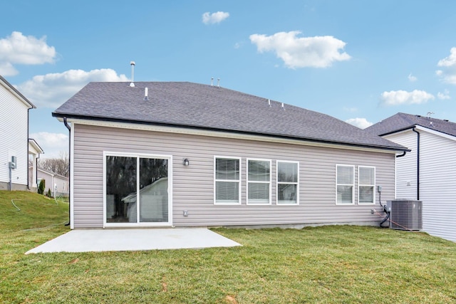 back of house with a yard, a patio, and central AC unit