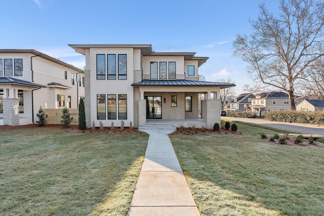 view of front of home featuring a porch and a front lawn