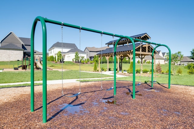 view of jungle gym with a lawn