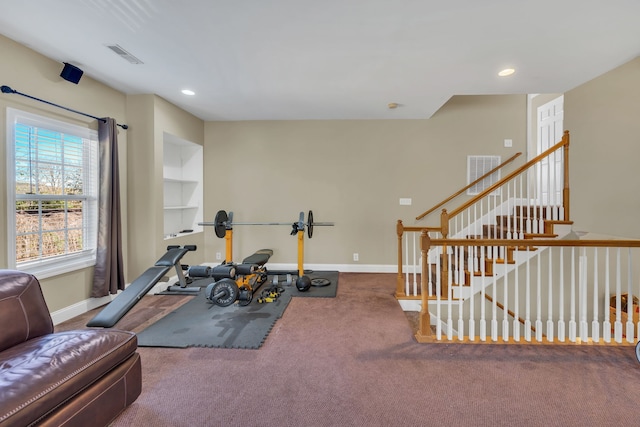 workout area with carpet floors