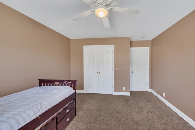 bedroom featuring carpet, a closet, and ceiling fan