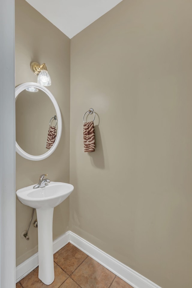 bathroom with tile patterned flooring