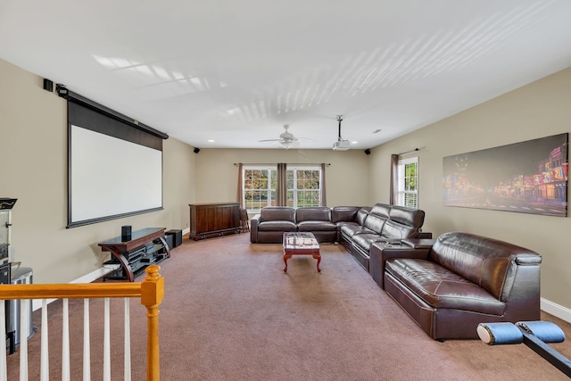 carpeted cinema with ceiling fan