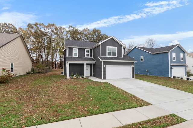 front facade featuring a front yard and a garage